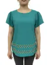 Blusa color turquesa con punto de cruz de varios colores