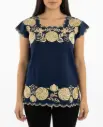 Blusa azul marino con flores circulares doradas