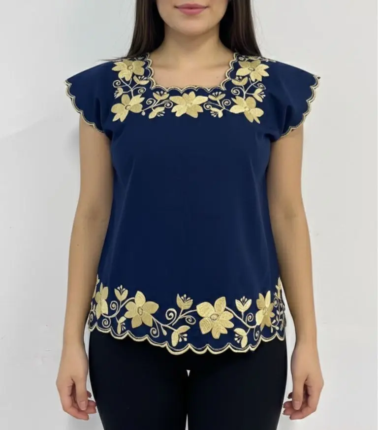 Blusa azul marino con flores y retoños dorados