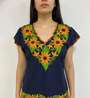 Blusa azul marino con girasoles y hojas verdes con borde naranja