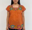 Blusa naranja puntos blancos bordes verdes