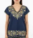 Blusa azul marino con detalle de flores y borde doradas 