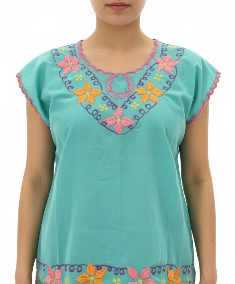 Blusa color menta con flores amarillas y rosas