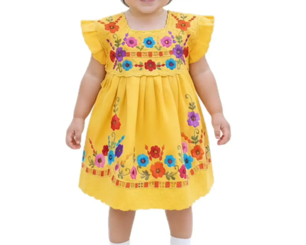 Vestido infantil amarillo con flores multicolor